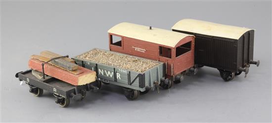 An SR box van, no.61392, in black, a LNWR 15T open wagon, no.15, an SR bolster wagon with timber,